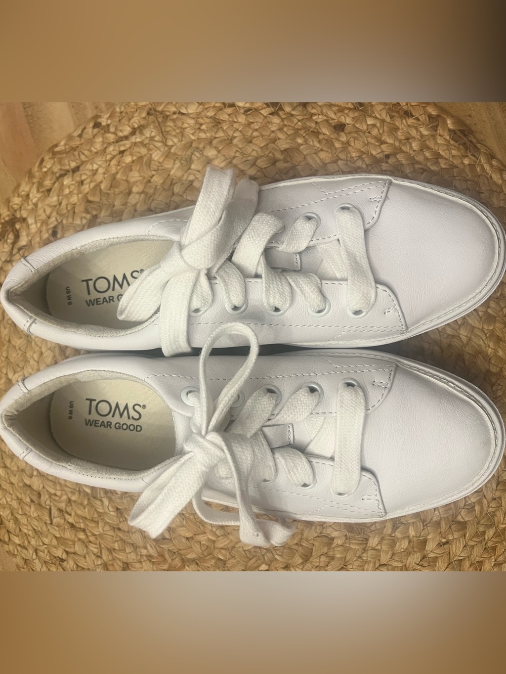 Toms white leather sneakers. Gently worn. Size 6
